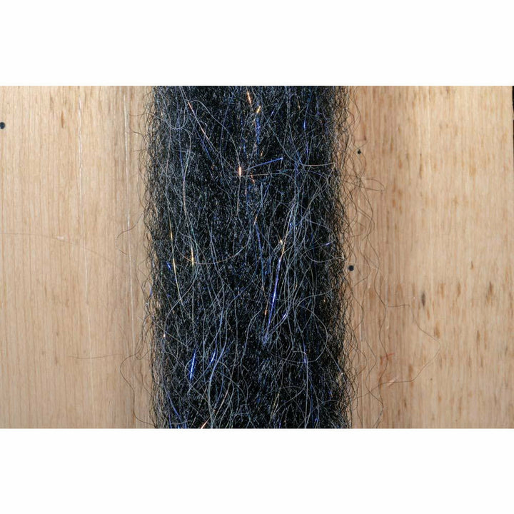 Dark charcoal black fly tying material with metallic blue and copper-gold fibers