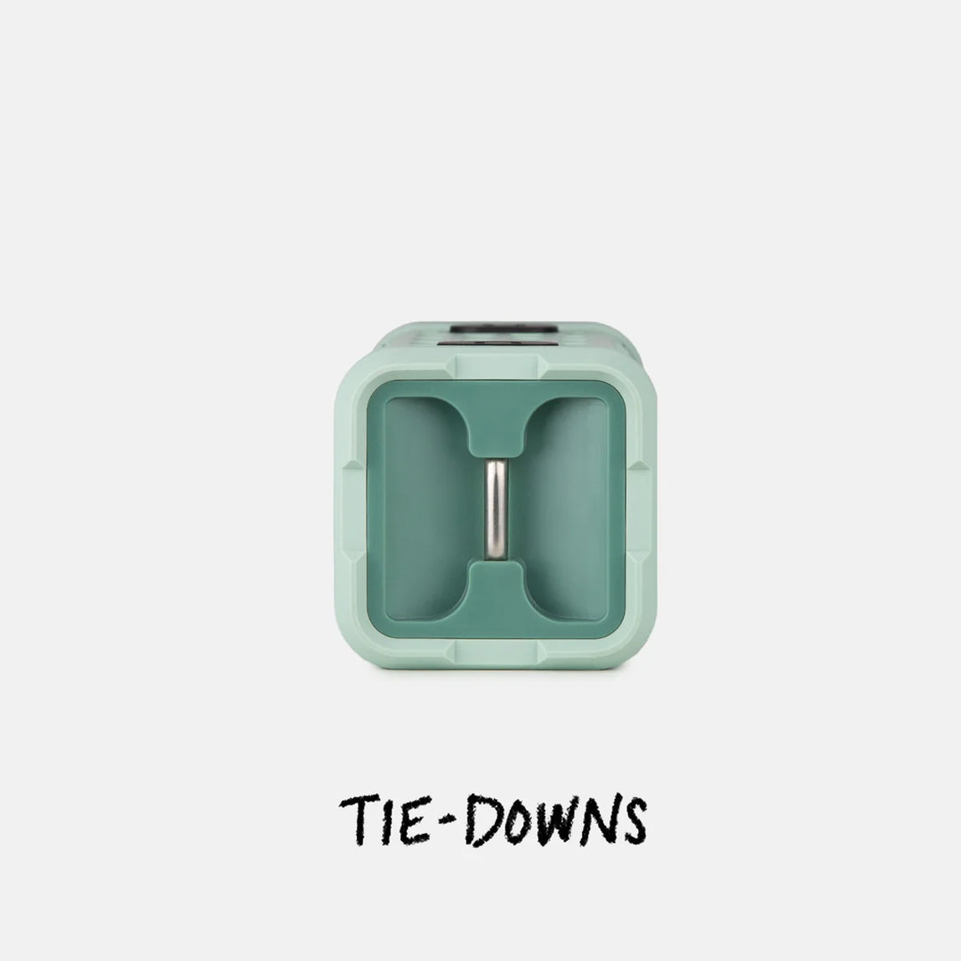 Bottom view of Turtle Box Ranger speaker showing metal D-ring tie-down point for mounting