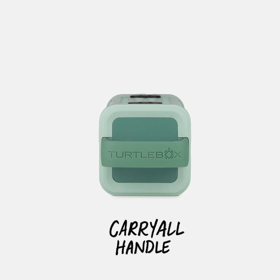 Top view of Turtle Box Ranger carrying handle strap embossed with brand logo