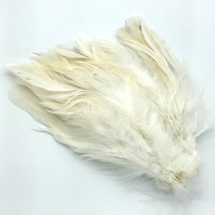 Cream-colored UV2 Strung Schlappen fly tying feathers with translucent guard hairs