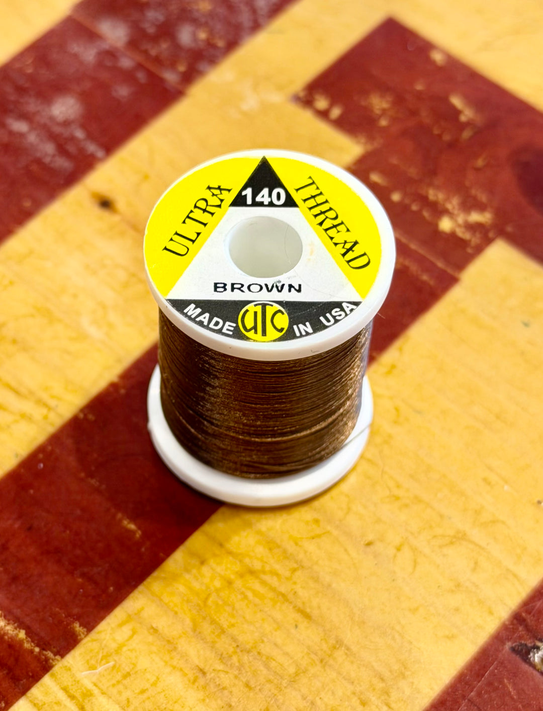 Earth Brown Wapsi Ultra 140 thread spool
