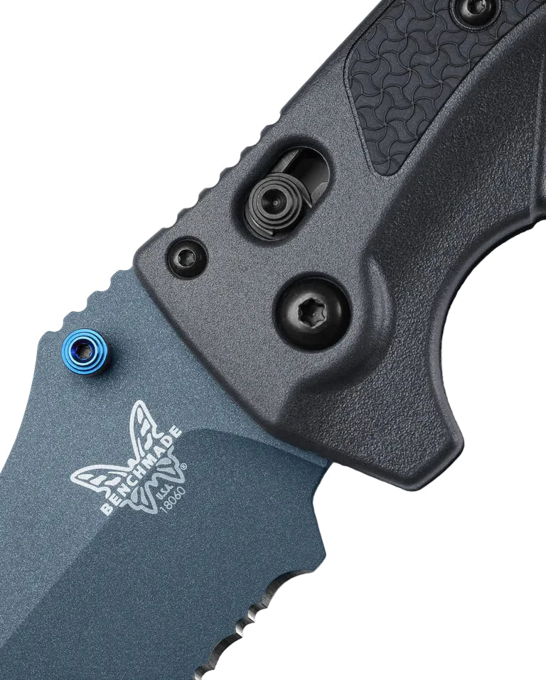 Close-up of Benchmade Adira pivot showing blue hardware, frame lock, and etched logo