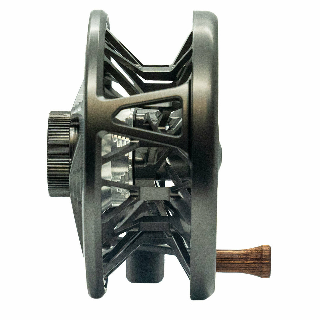 Close-up of Bauer RVR reel side profile revealing knurled drag knob and machined metal texture