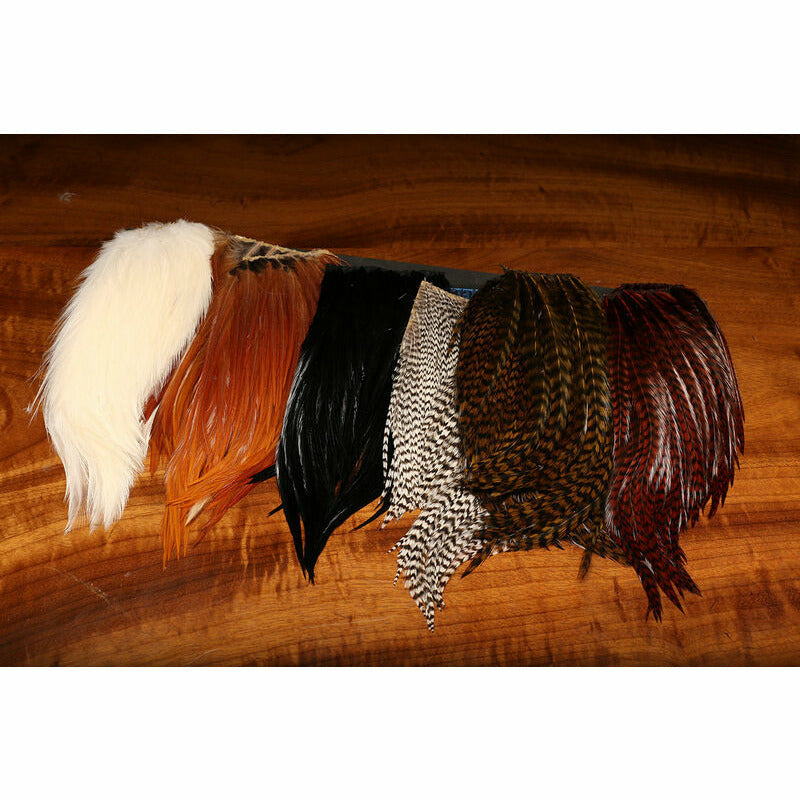 Hareline Dubbing Bugger Hackle Patches fly tying materials including white fur, brown hackles, and speckled feathers