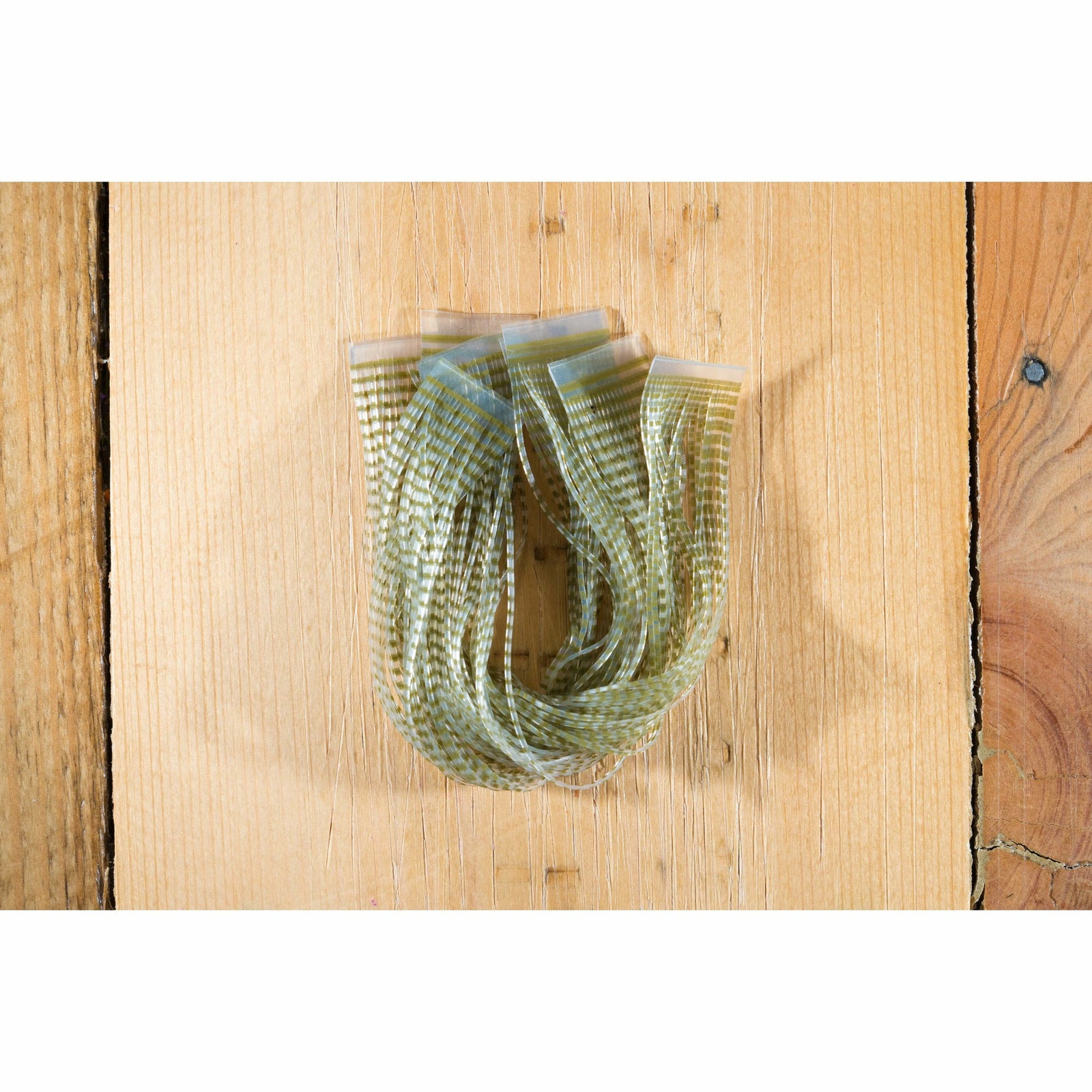 Olive barred clear Chicone's Crusher Legs fly tying material