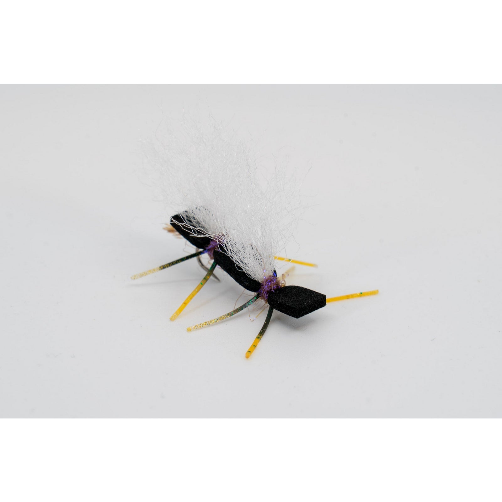 Chubby Chernobyl DIY Kit - Sunrise finished fly with black foam body, white trigger point collar, and yellow glitter legs