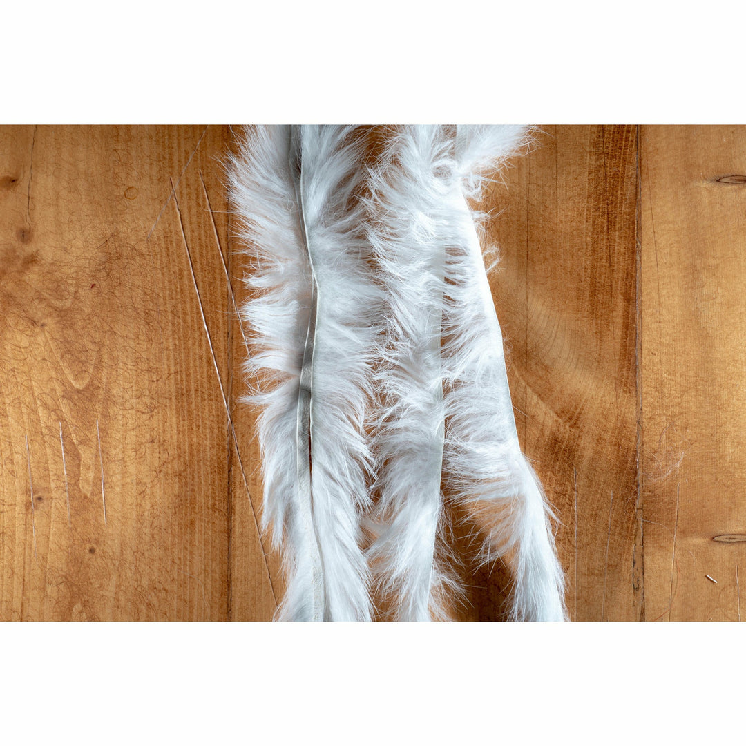 White crosscut rabbit fur strip with silky long fibers