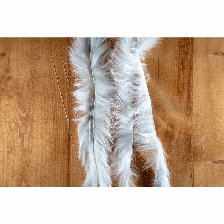 White crosscut rabbit fur strip with silky long fibers