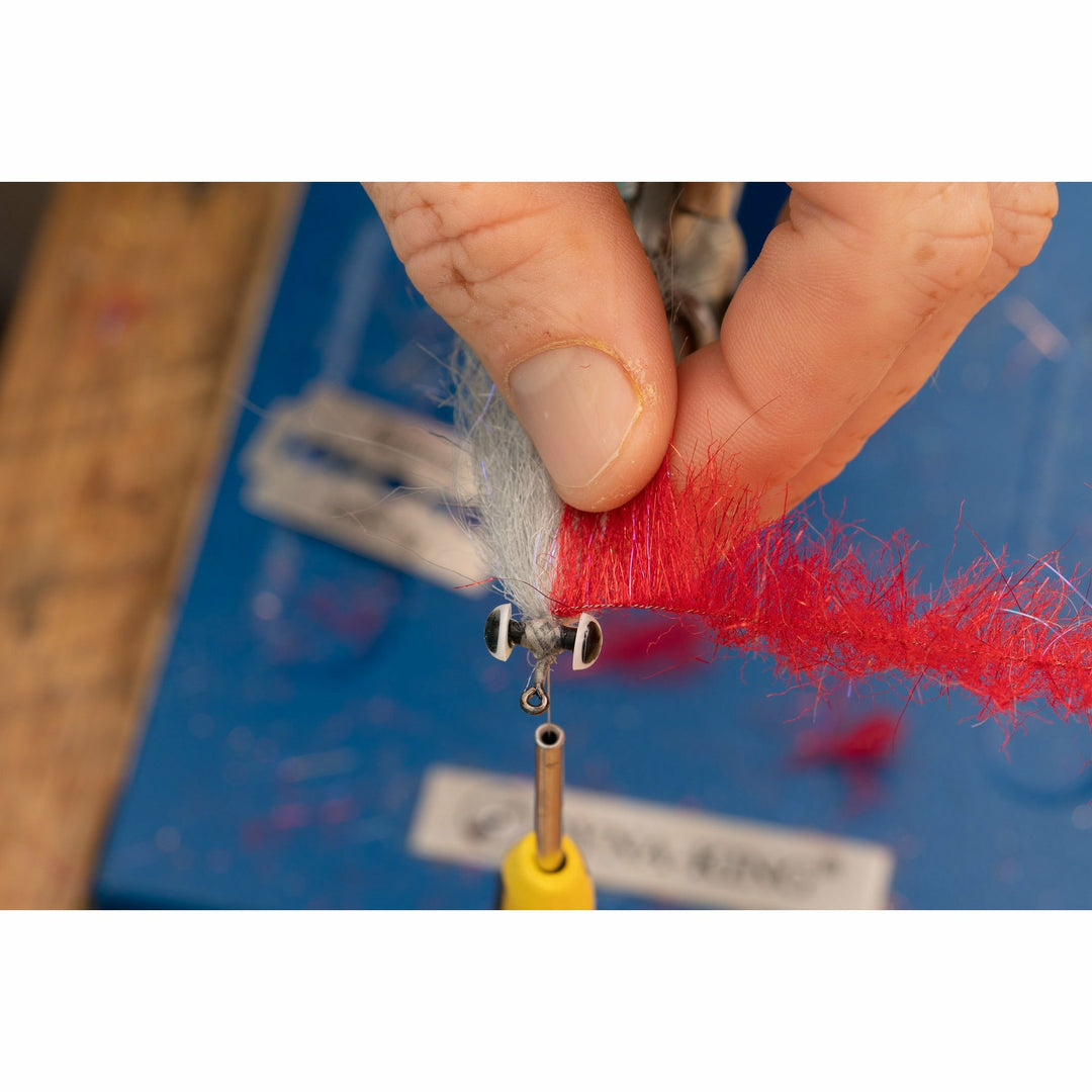 Attaching grey brushes and red SF fibers to DL3 Minnow hook in vise