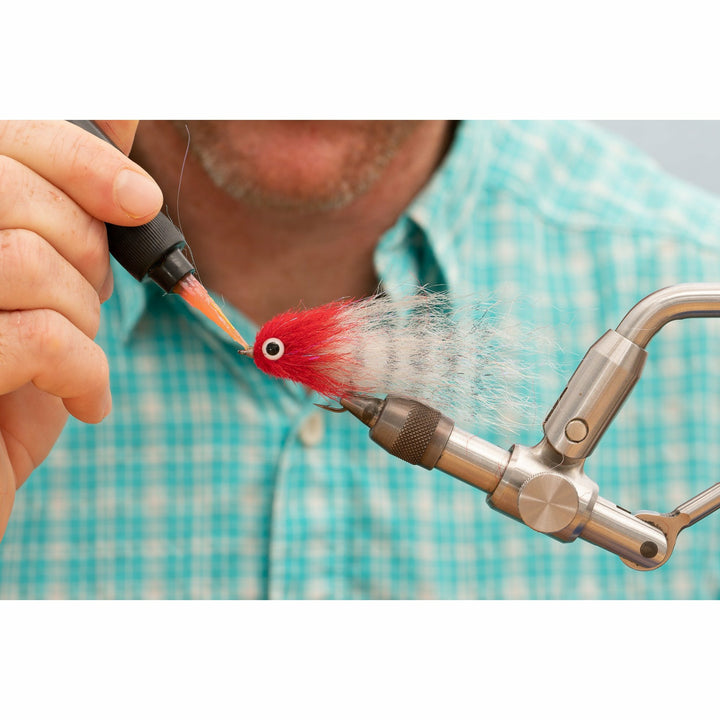 Tying DL3 Minnow fly head material using orange tool in vise for Banana Creme kit