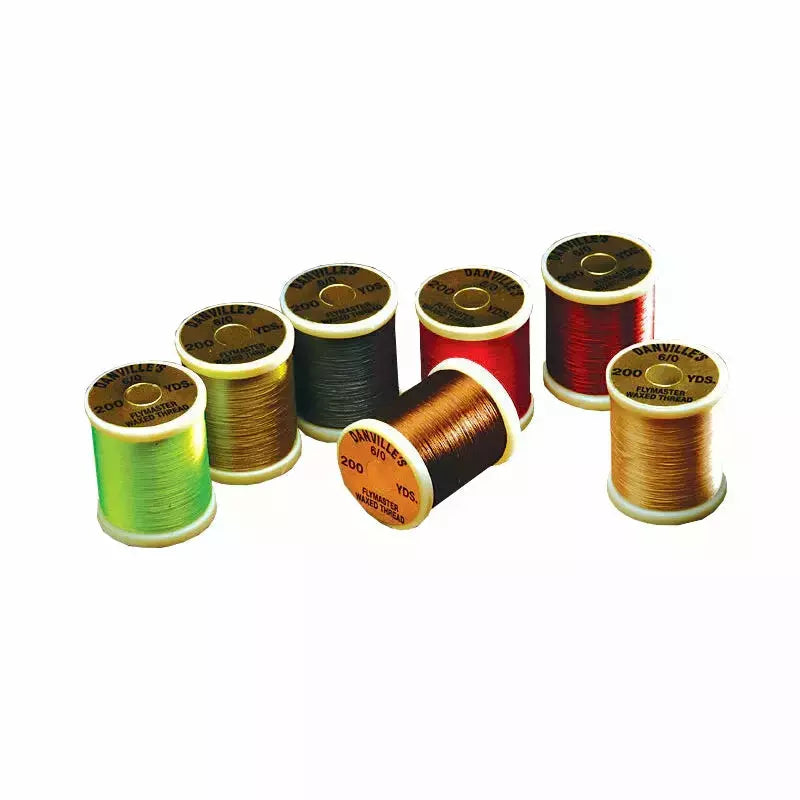 Danville 6/0 Flymaster Waxed Thread spools in assorted colors for fly tying