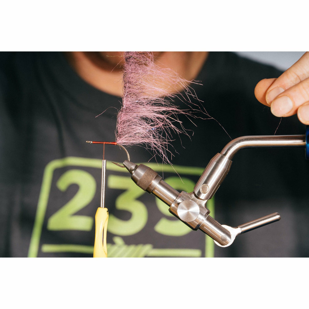 Positioning hot pink EP Craft Fur brush on hook shank