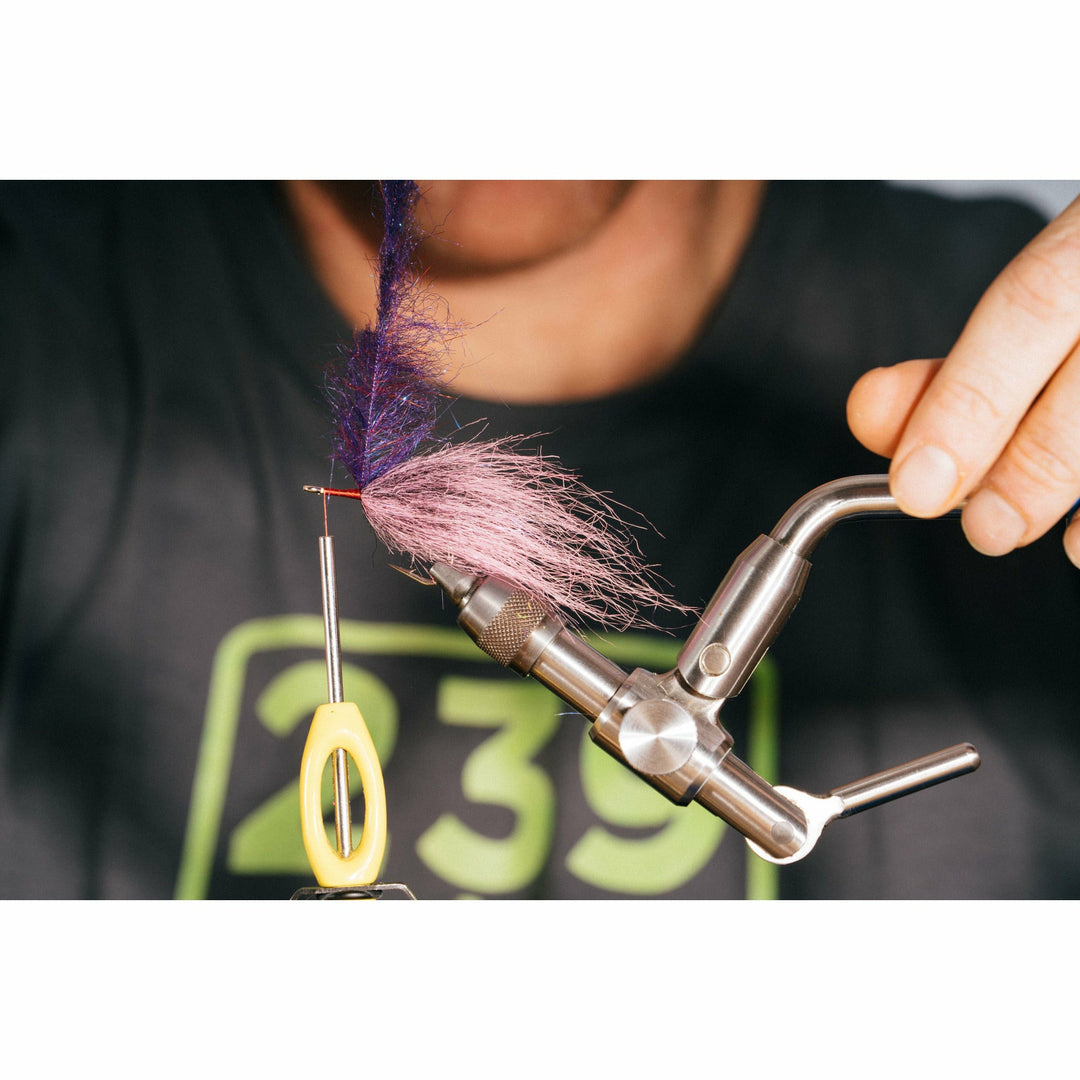 Adding EP Minnow Head Brush to hook in tying vise