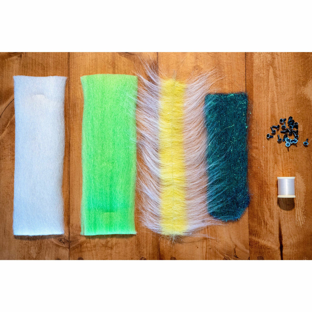 EP Half &amp; Half DIY Kit flat lay showing olive sparkle, chartreuse fibers, craft fur brush, and blue pearl eyes for fly tying
