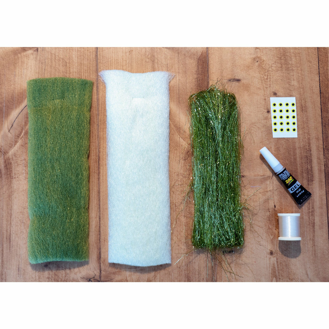 EP Minnow DIY fly tying kit with green back fibers, flash, yellow eyes, and thread
