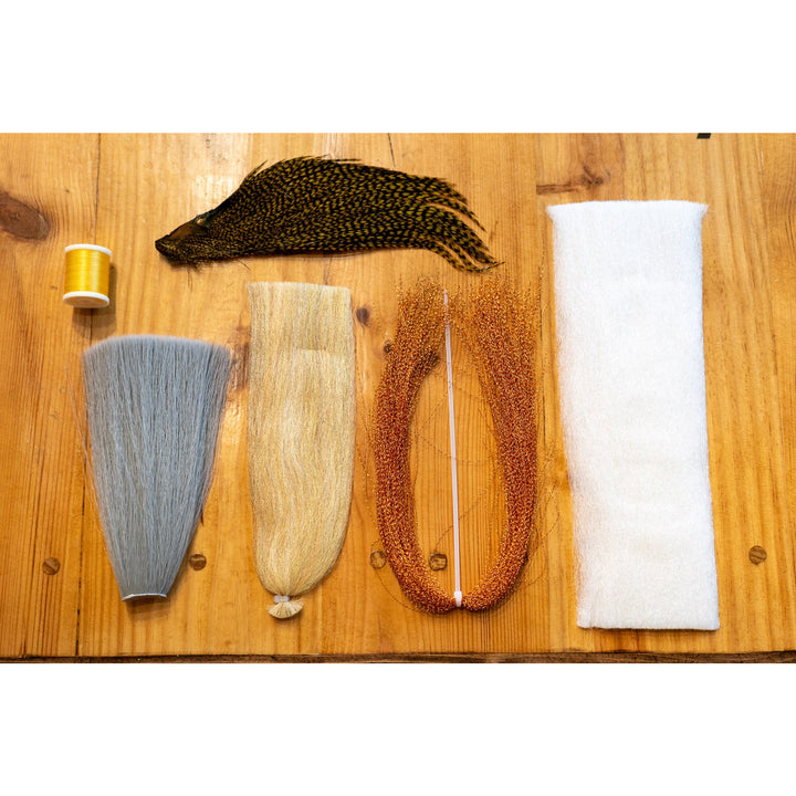 EP Para Dry Fly DIY Kit materials including grey faux bucktail, copper krystal flash, and yellow thread