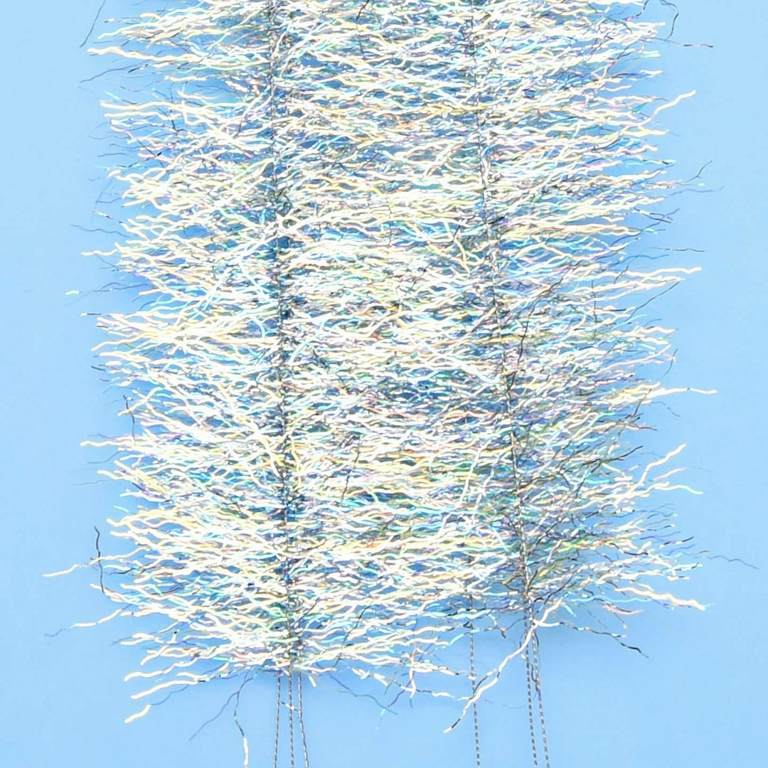 Silver and pale blue reflective EP Thunderstruck Brush fly tying material on light blue background
