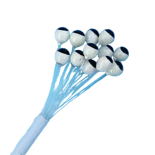 White UV reflective fly tying eyes with black pupils on blue stems