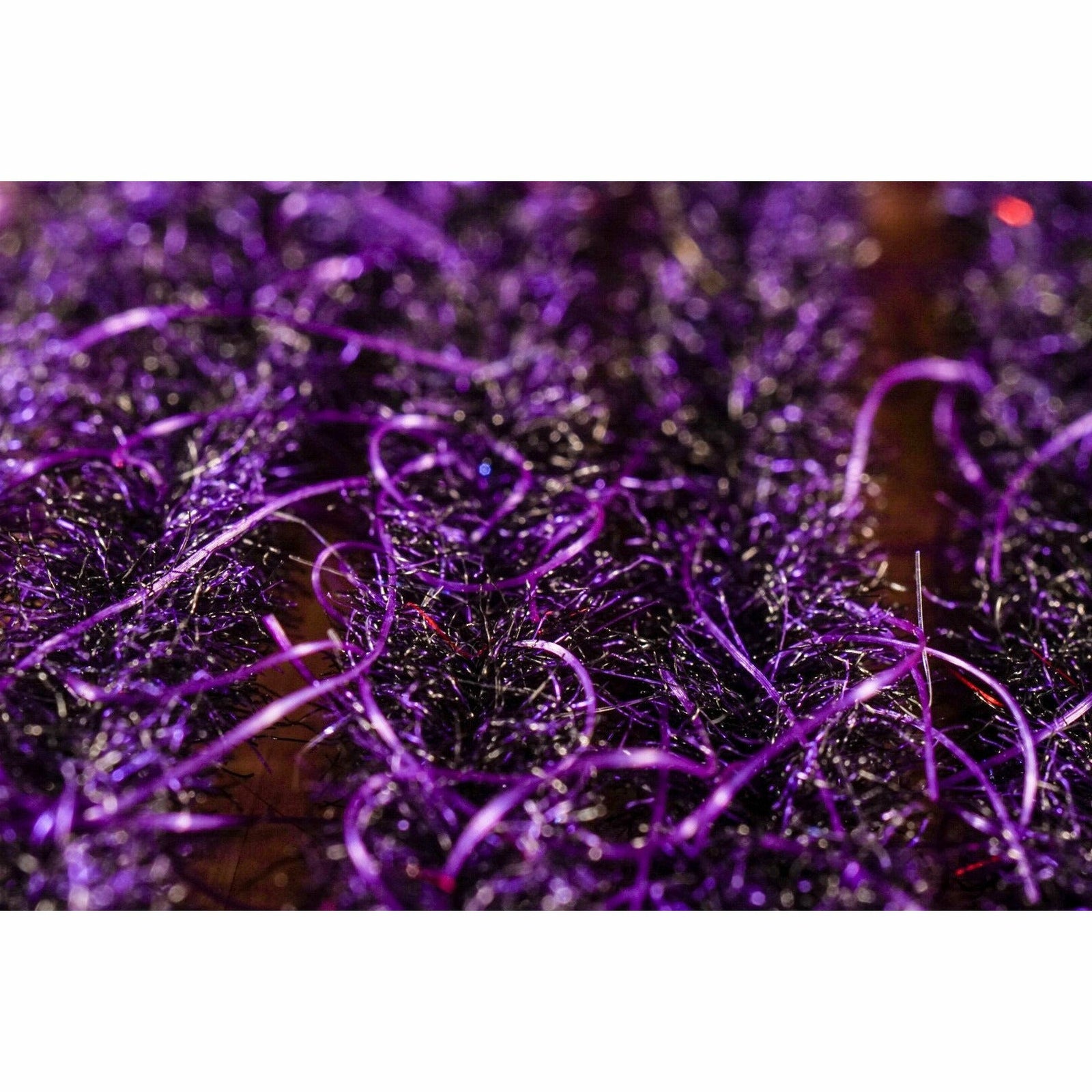 EP Wooly Critter Brush .5" Black & Purple macro detail of shiny purple synthetic fibers