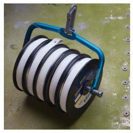 Fishpond Headgate XL tippet holder with blue frame holding large RIO saltwater spool