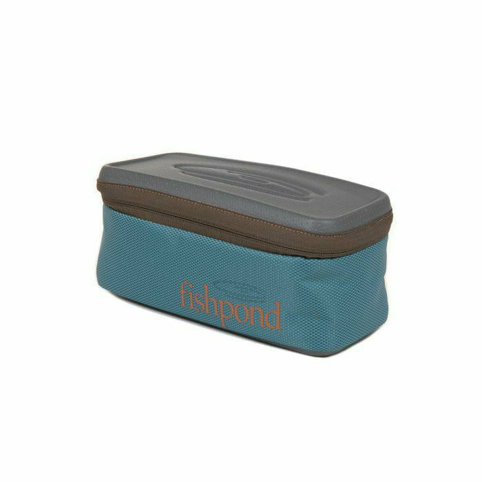 Closed Fishpond Ripple Reel Case showing molded hard shell and textured fabric exterior