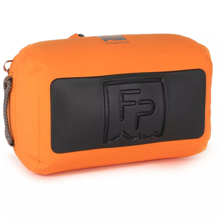 Fishpond Thunderhead duffel bottom featuring rubberized base plate with embossed shield logo