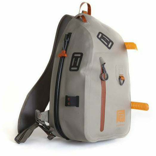 Light beige Fishpond Thunderhead Submersible Sling bag with orange accents and grab handle