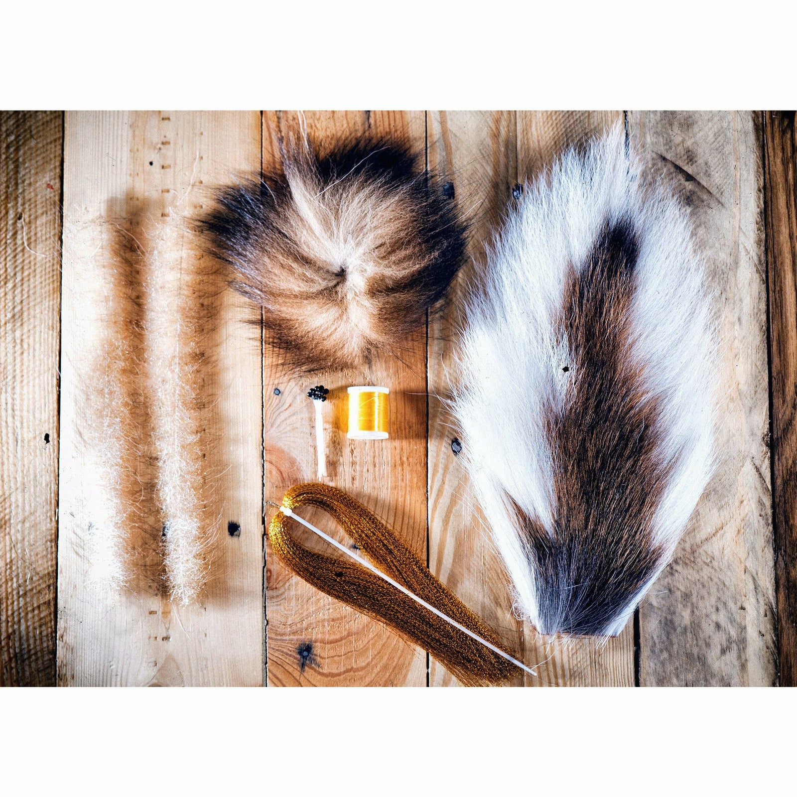 Foxy Shrimp DIY Fly Tying Kit materials including white crab fur and gold Krystal Flash