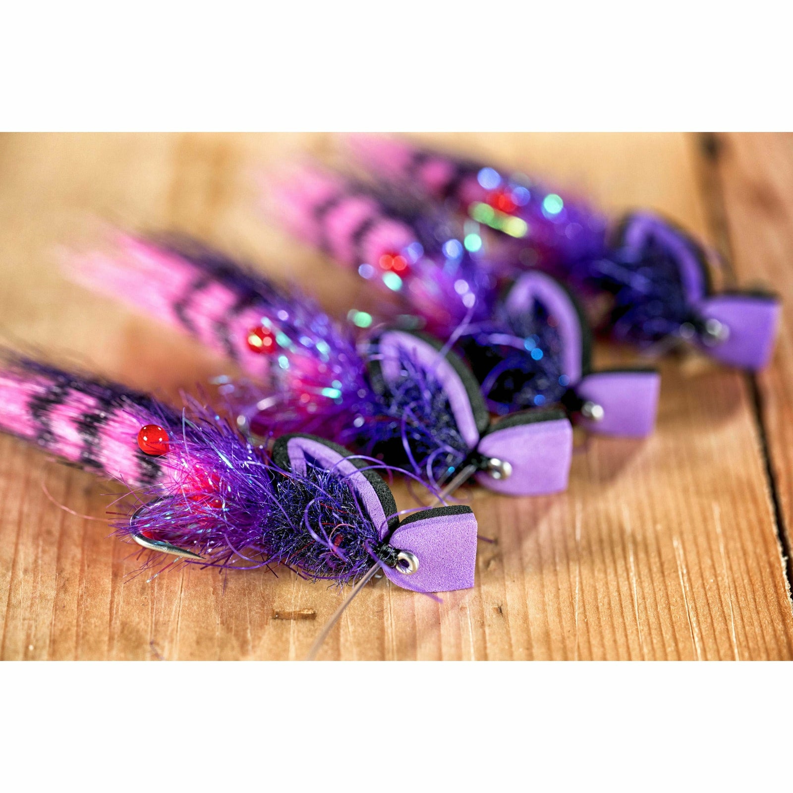 Neon Grape Gangster Gurgler DIY fly tying kit finished lures with pink purple foam wings