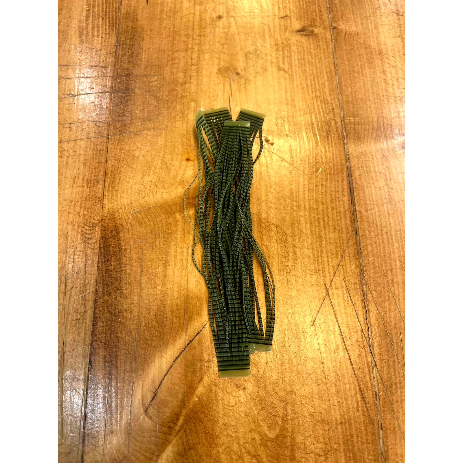 Black barred olive Grizzly Flutter Legs fly tying material