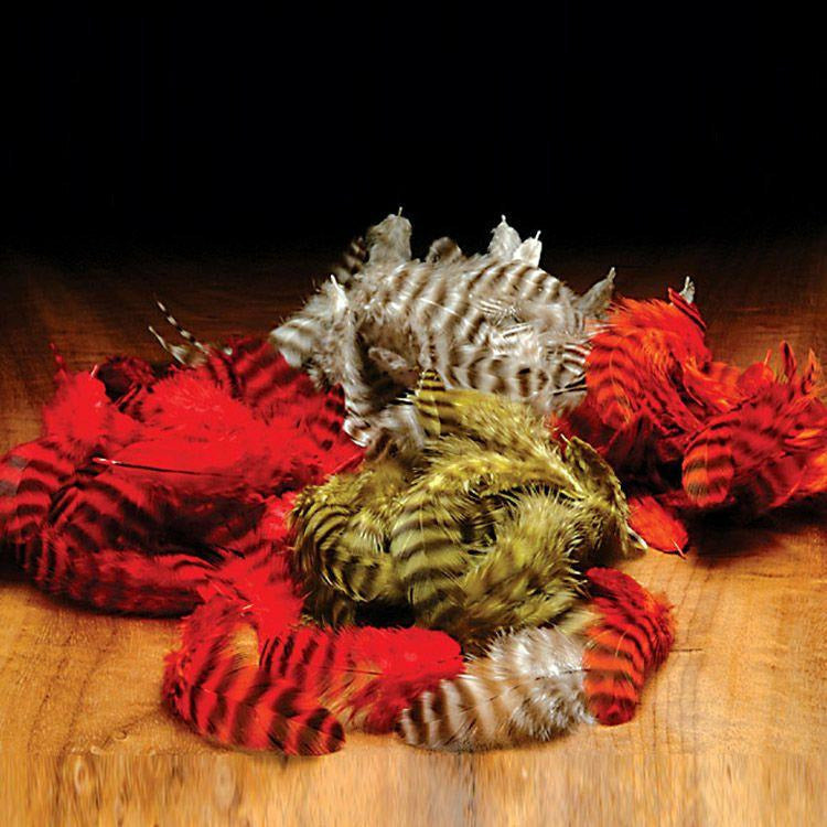 Grizzly soft hackle fly tying feathers in red, olive green, and grey