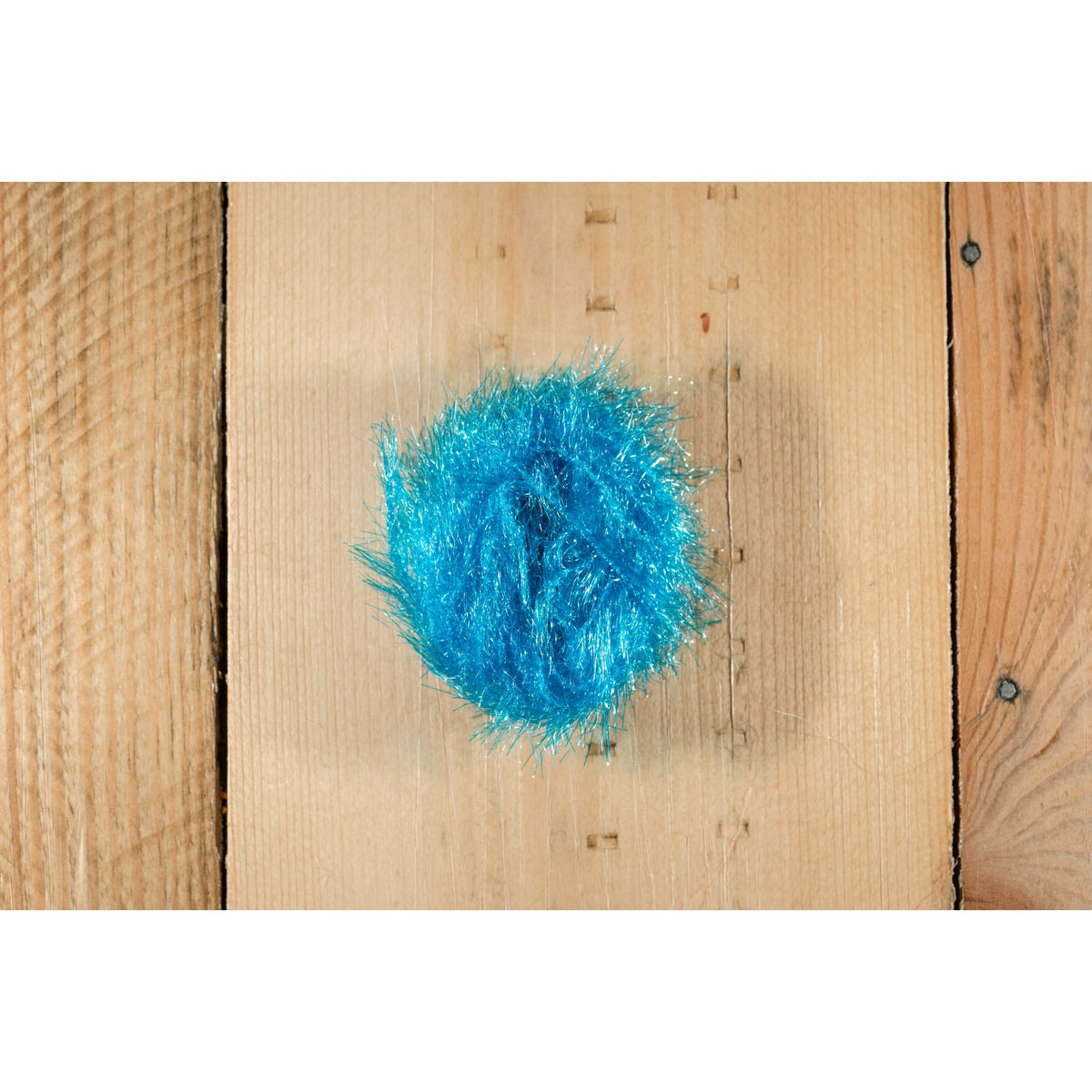 Blue Krystal Hackle fly tying material with iridescent flash fibers
