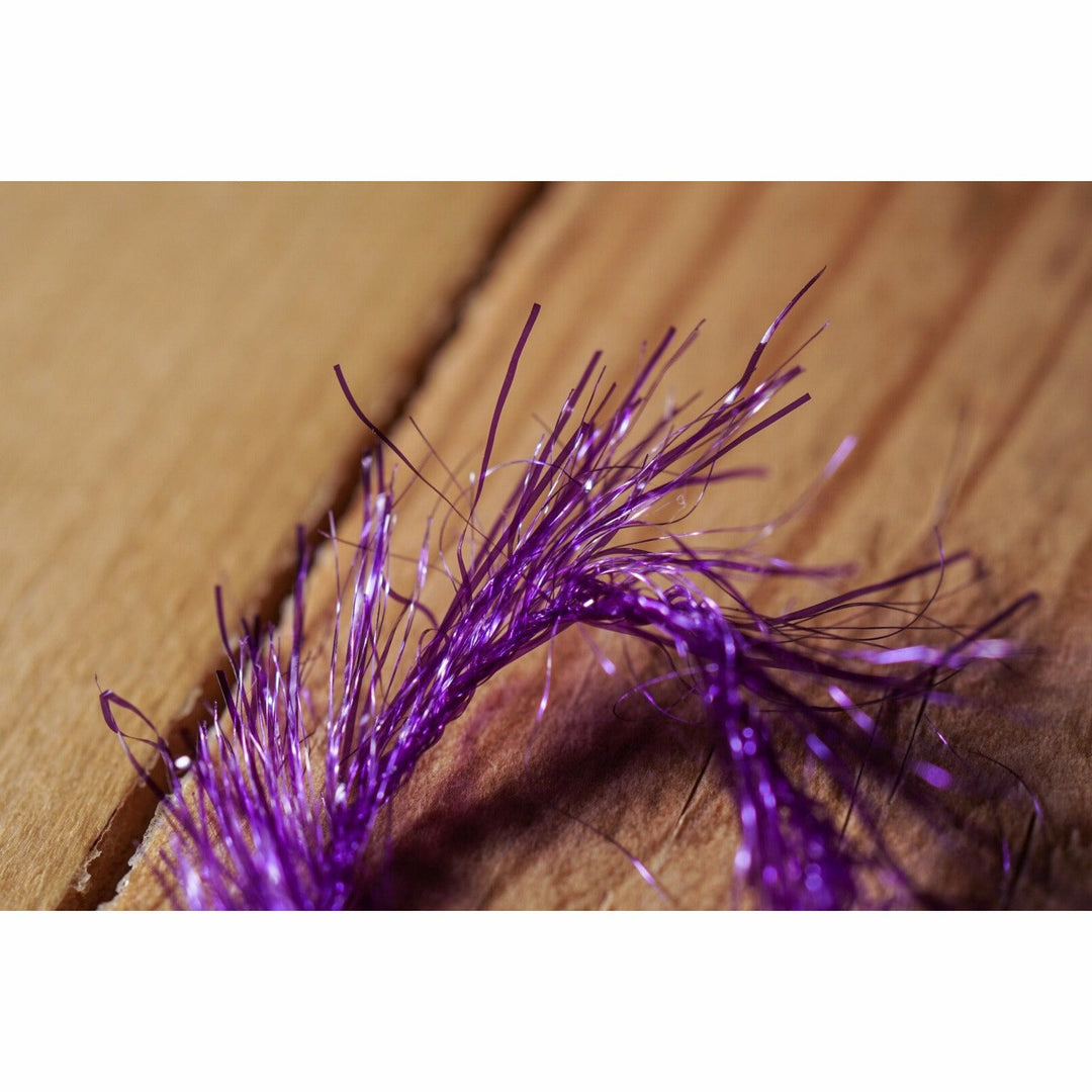 Close-up of iridescent purple synthetic Krystal Hackle fibers