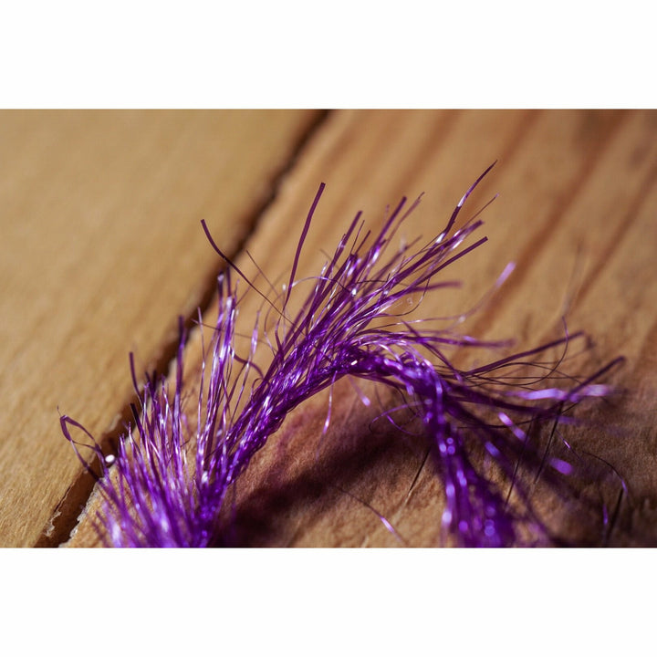Close-up of iridescent purple synthetic Krystal Hackle fibers