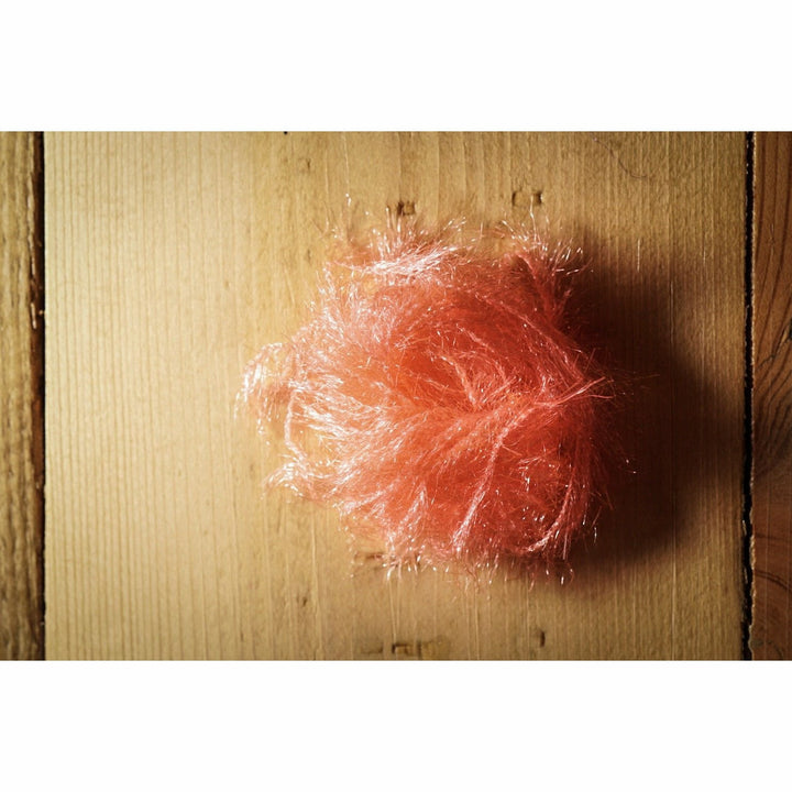 Bundle of Hareline Dubbing Krystal Hackle in vibrant shrimp pink for fly tying