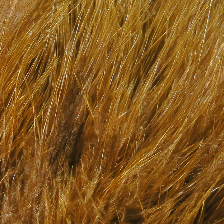 Golden brown marabou fly tying feathers texture