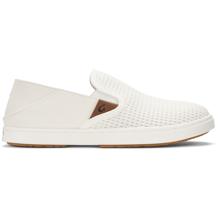 Olukai Pehuea off-white slip-on sneaker for women featuring perforated mesh and gum sole