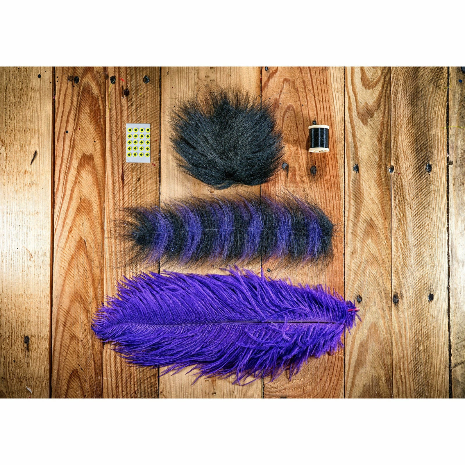 239 Flies DIY material kit contents including black thread purple fibers and yellow fly eyes
