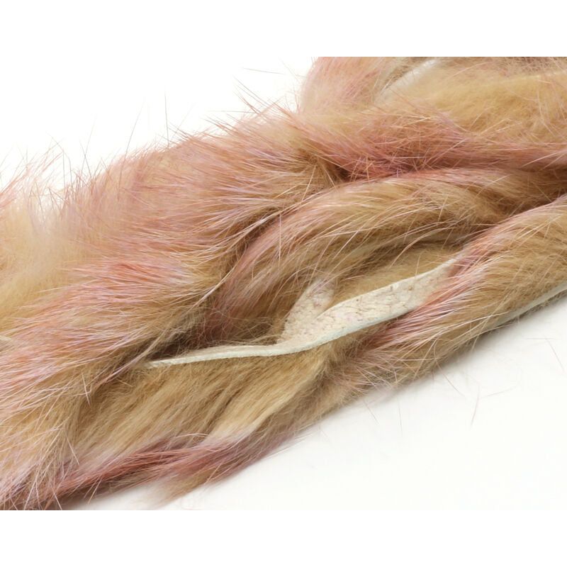 Hareline Dubbing tri-color rabbit strip fly tying material featuring tan, cream, and pinkish-red fur