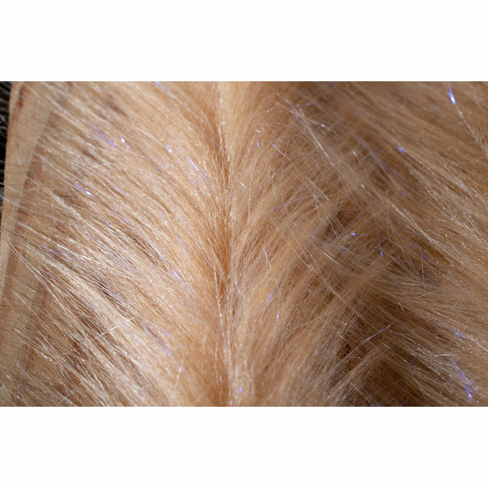 Macro view of camel polar fiber brush texture and sheen