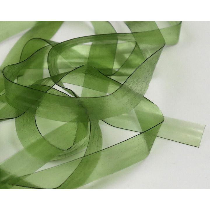 Olive green Scud Back fly tying material with black edges