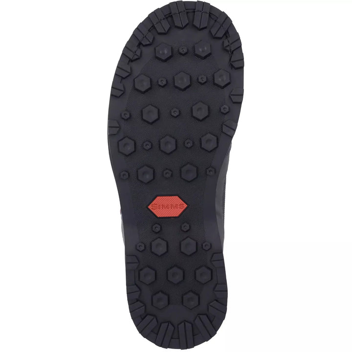 Multi-directional lug rubber outsole of Simms Tributary wading boot with hexagonal traction pods