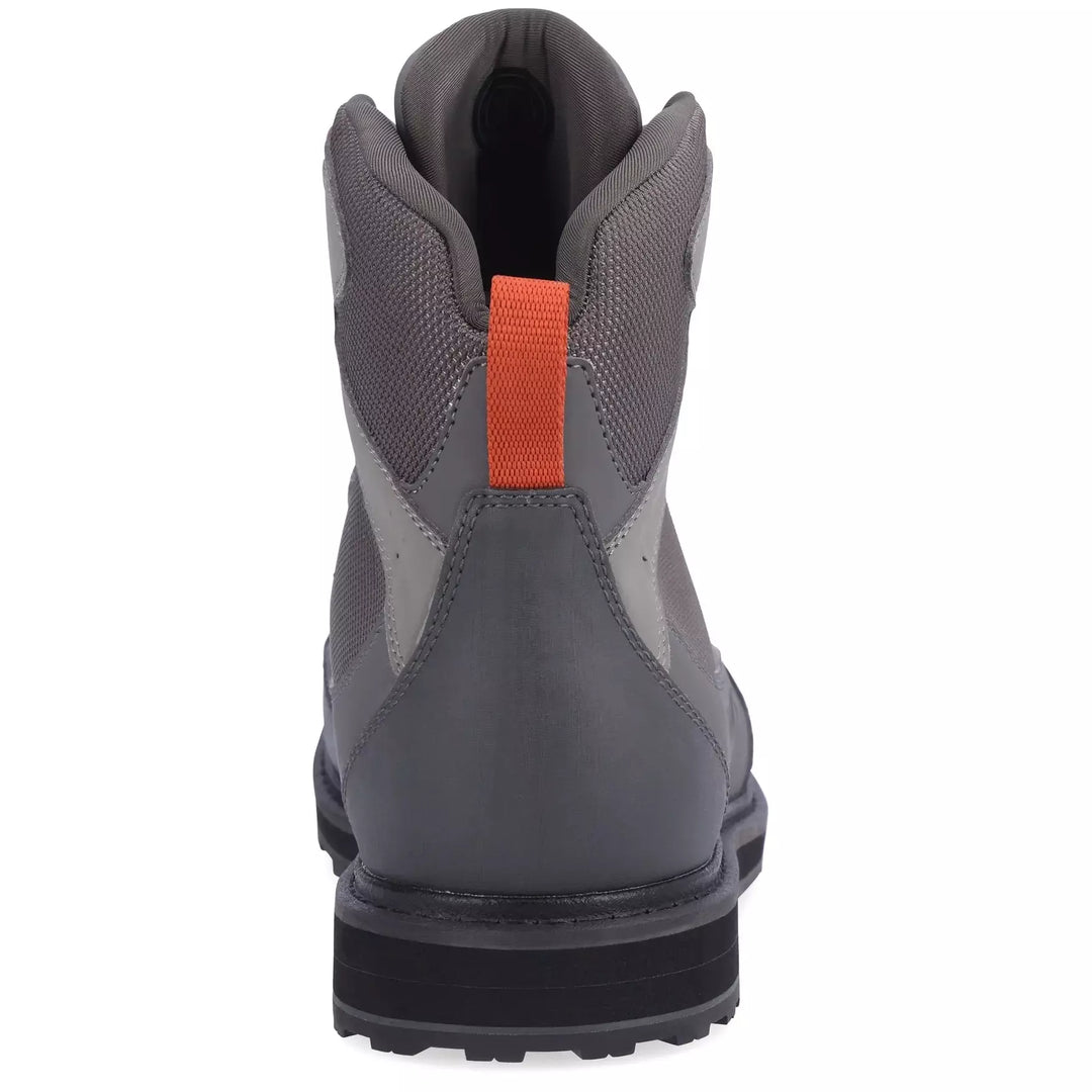Rear view of Simms Tributary wading boot featuring orange heel pull tab and neoprene lining
