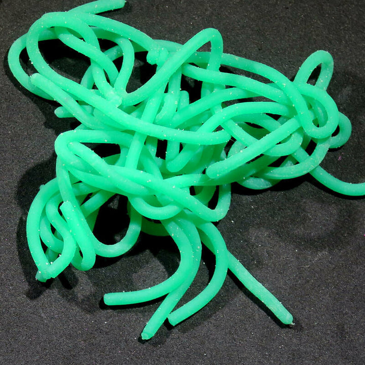 Neon green tubular Squirmy Wormies fly tying material texture
