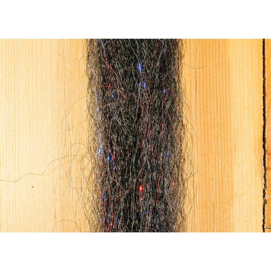 Steve Farrar SF Blend Bleeding Black fly tying material with red and blue flash fibers