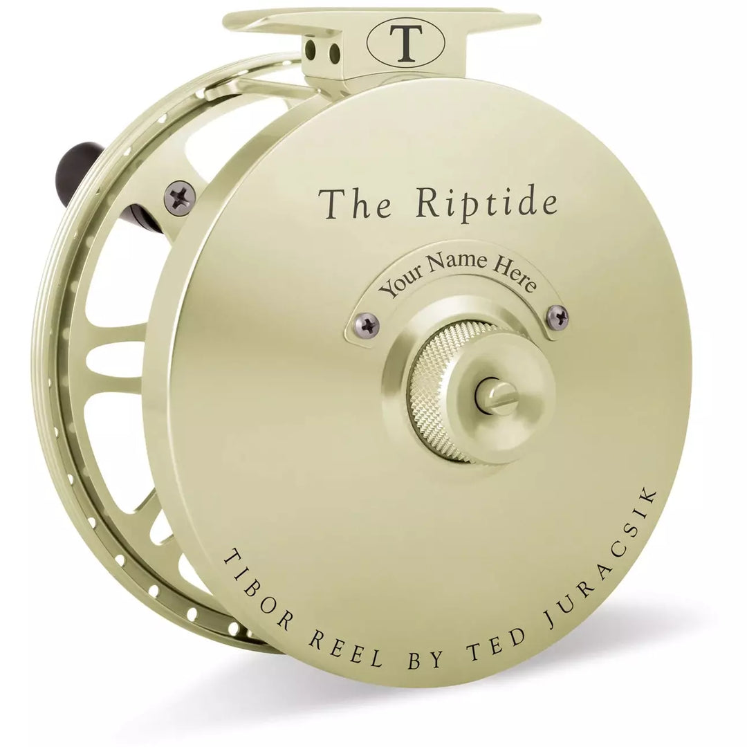 Champagne gold Tibor Riptide fly reel featuring personalized engraving area and metal drag knob
