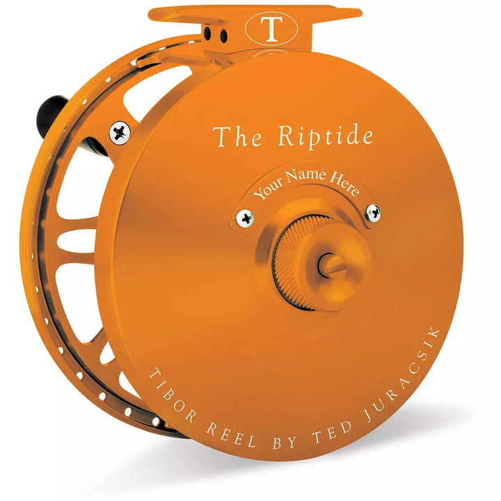 Orange Tibor Riptide fly reel featuring large outer hub for increased line capacity