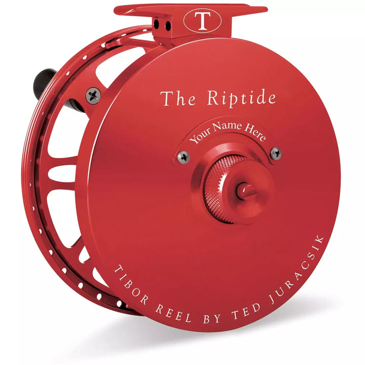 Bright red Tibor Riptide fly reel with open-frame spool design for fast line retrieval
