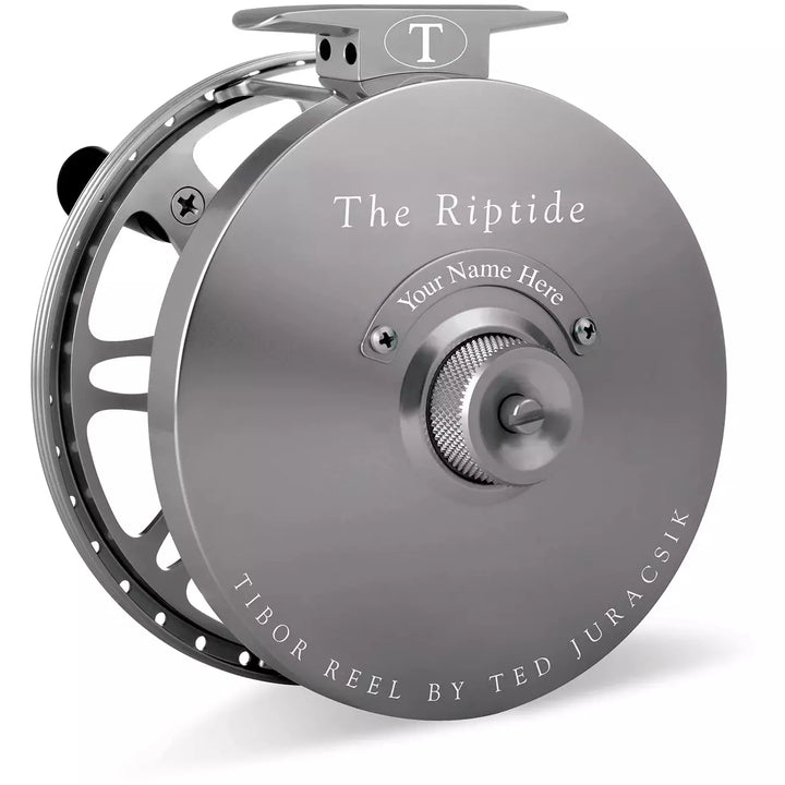 Gunmetal grey Tibor Riptide fly reel with textured drag control and durable construction