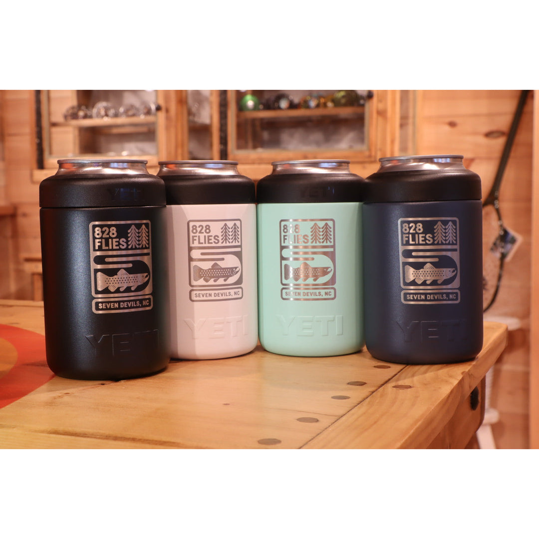 Set of four Yeti Colster can insulators in black, white, mint, and navy